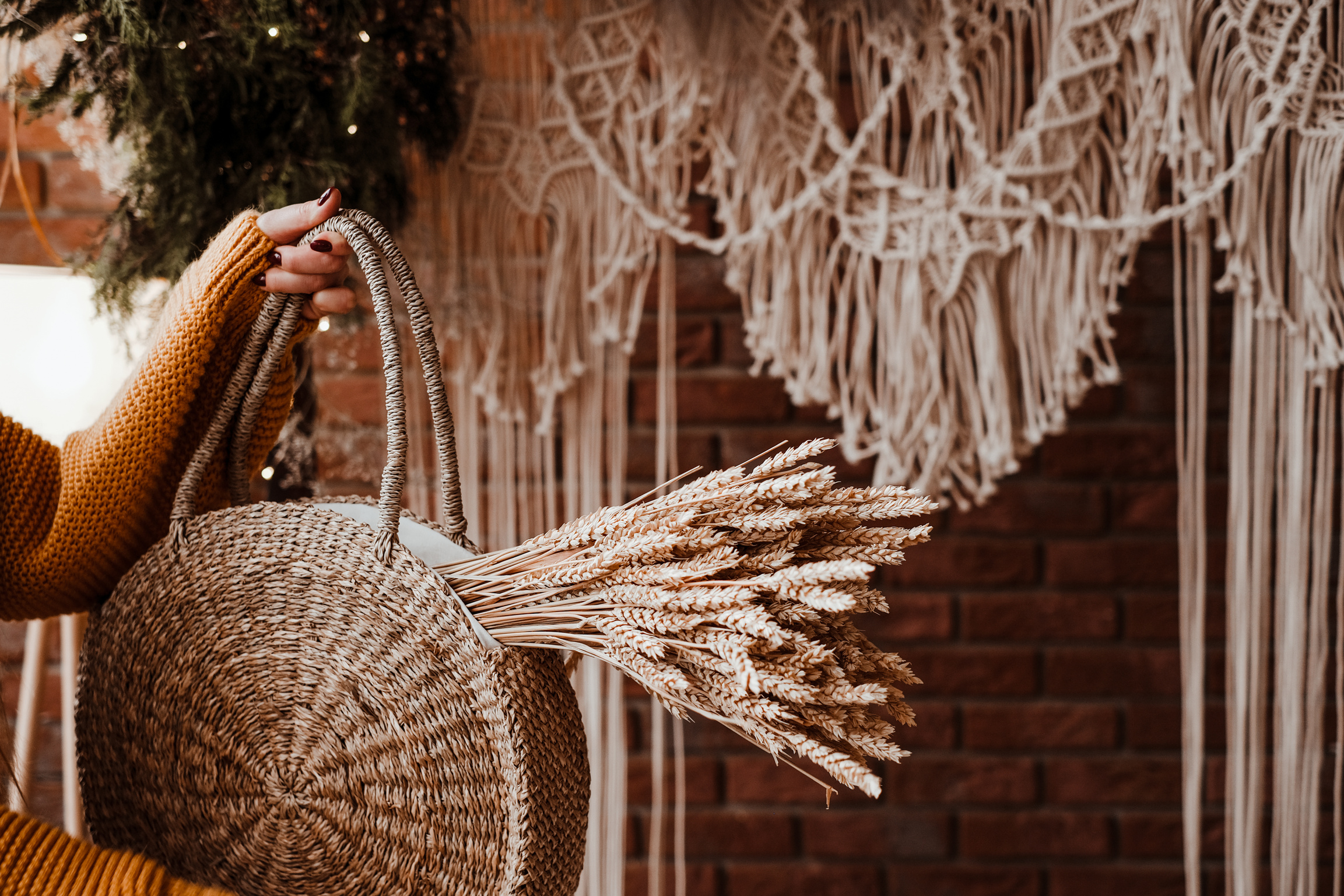 Woman Holding Woven Bag with Dried Wheat Bunch